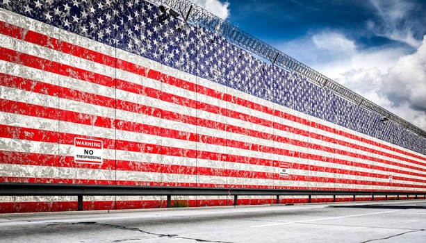 border wall american flag and a warning sign stating no trespassing