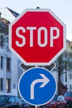 Stop sign, traffic sign Stop! Give way, Stop, traffic sign, direction arrow to the right, Germany
