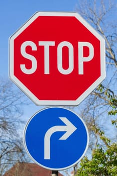 Stop sign, traffic sign Stop! Give way, Stop, traffic sign, direction arrow to the right, Germany