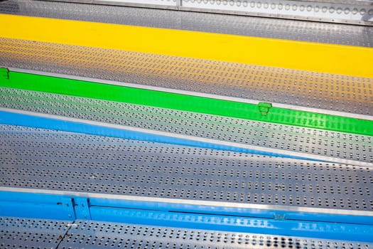 Colorful metal stair treads made of checker plate, Germany