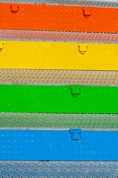 Colorful metal stair treads made of checker plate, Germany