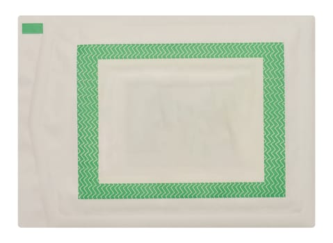 Paper white sachet for sterile medical wipes, food on isolated background, close up