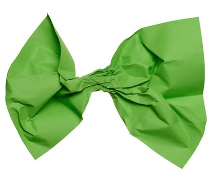 Crumpled green sheet of paper on isolated background, close up