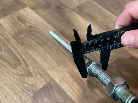 Caliper for measuring the a dimensions of parts