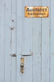 old  rusted  rust  rusty  sign  sign  symbol  exit  free  exit free  bla  garage door  garage  wood  gate  door  made of wood  Germany