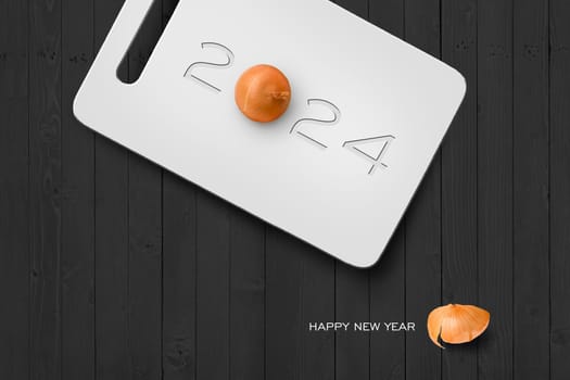 2024 Happy New Year Concept, 2020 Text on Plastic Antiseptic Cutting Board With Onion on Grey Wall Texture. Selection Path Included.
