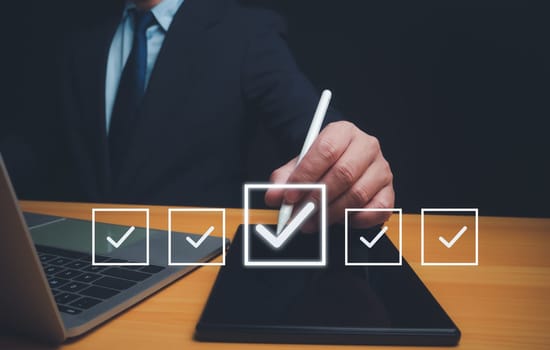 Businessman checks transaction documents or electronic contract documents, Check electronic documents on digital documents and checklist approval, Prepare check and approve concept.