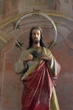 Sacred Heart of Jesus, statue on the altar of the Sacred Heart of Jesus in the parish church of St. Nicholas in Hrascina, Croatia