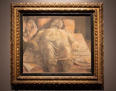 Milan, Italy - 23 September 2023: Brera antique painting museum. Lamentation over the Dead Christ, by Andrea Mantegna, 1483