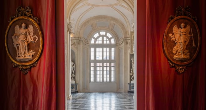Venaria Reale, Italy - 16 July 2023: luxury gallery perspective, decorative marble, indoor, nobody, Royal Palace. Italy travel destination.