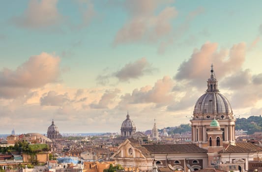 Rome, Italy. Urban landscape, blue sky with clouds, church exterior architecture.