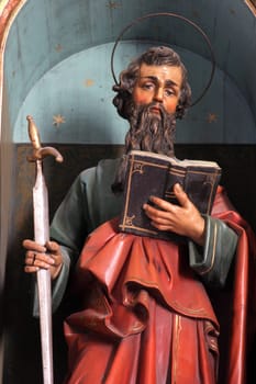 Saint Paul, a statue on the main altar in the parish church Sacred Heart of Jesus and St. Ladislaus in Mali Raven, Croatia