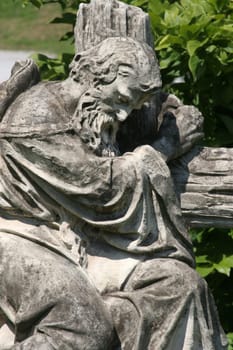Tired pilgrim, statue in front of the National Shrine of Saint Joseph in Karlovac, Croatia