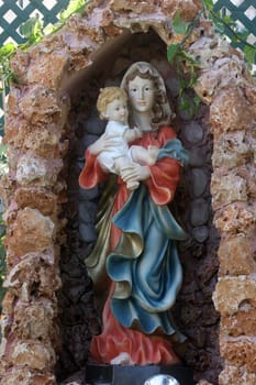 Virgin Mary with baby Jesus, statue in the courtyard of house Casa Nova in Bethlehem, Israel