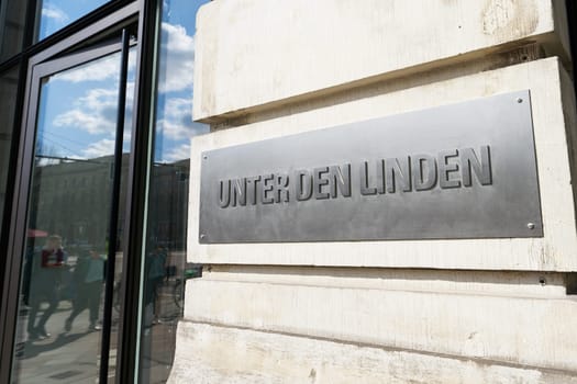 Street sign with the street name Unter den Linden in the district Berlin-Mitte in Germany