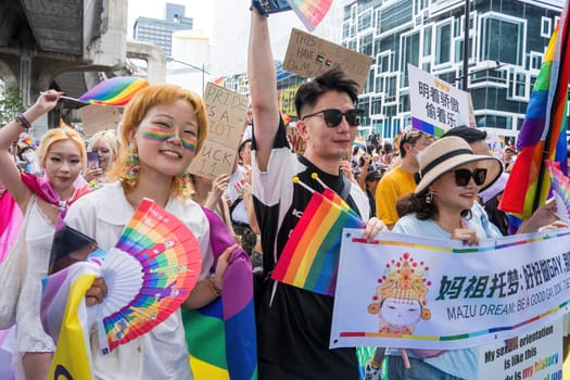 Bangkok, Thailand - JUN 1, 2024 Bangkok Pride Festival 2024, The short action and atmosphere of people joins celebrations in the event in Siam Square Bangkok, Thailand. Gender diversity There is no division of age, race or religion.