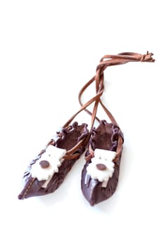 Traditional Bulgarian folk leather shoes - tsarvuli. Selective focus with shallow depth of field.
