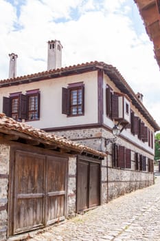Zlatograd, Bulgaria - July 9,2021-Traditional Bulgarian house from the Revival era. Selective focus with shallow depth of field.