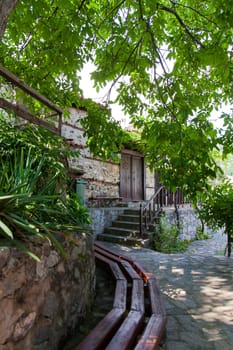 Zlatograd, Bulgaria - July 9,2021-Traditional Bulgarian house from the Revival era. Selective focus with shallow depth of field.
