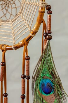 Dreamcatcher - a traditional mascot for Native American folklore. Selective focus with shallow depth of field.