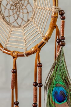 Dreamcatcher - a traditional mascot for Native American folklore. Selective focus with shallow depth of field.