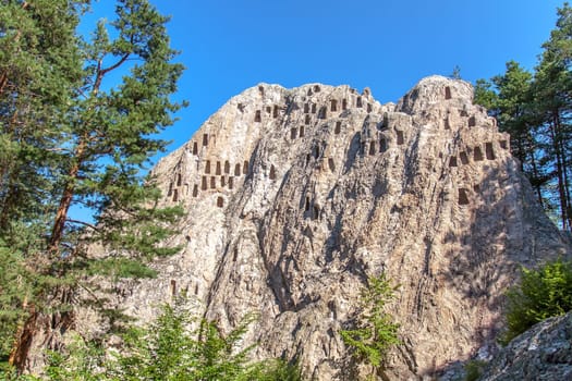 Ardino, Bulgaria - July 9,2021- "Kartal kaya"" rock-cult complex in the southern Rhodopes, dating from the Iron Age.Selective focus with shallow depth of field."