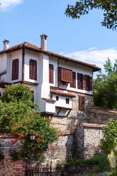 Zlatograd, Bulgaria - July 9,2021-Traditional Bulgarian house from the Revival era. Selective focus with shallow depth of field.