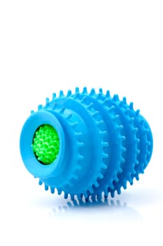 Silicone ball dryer removes moss from clothes and prevents creasing of clothes when drying. Selective focus with shallow depth of field.