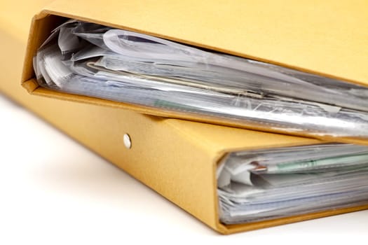 Cardboard folders for storing and archiving documents. Selective focus with shallow depth of field.