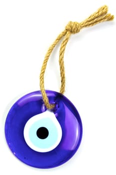 Traditional Oriental souvenir, blue glass eye to protect against evil.