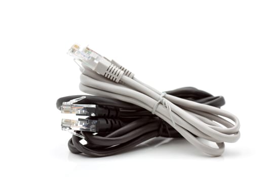 Two new cables for connecting home devices to the Internet. Selective focus with shallow depth of field.