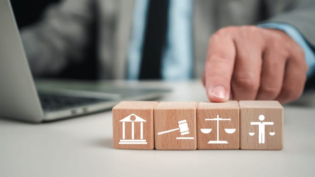 Businessman pointing his finger at virtual global law icons on  for business legal advice, Labor law, Attorney at law, Legal advice business concept, Lawyer icon, Lawyer man, Lawyer background.
