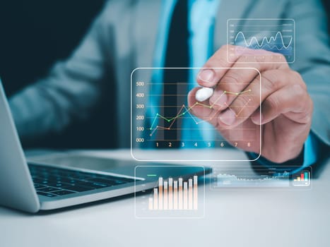 Business people use computers to analyze business and manage corporate data, business analytics with charts, metrics and KPIs to improve organizational performance, marketing, financial organization strategy.