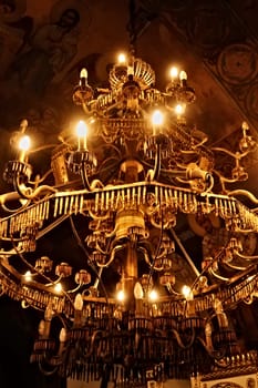 A chandelier inside the Ruzica Church, made out of weapons and cartridge cases, bullets, Kalemegdan Fortress, Belgrade, Serbia 2022