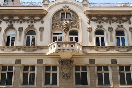 The elaborate facade of the Aron Levi Trading House decorated with many ornaments and reliefs, an example of Art Nouveau architecture in the city center of Belgrade, Serbia 2022