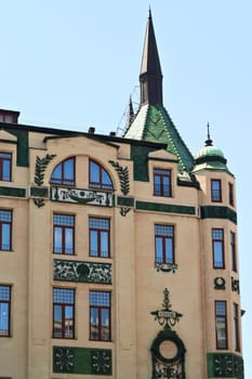 Facade with windows and green reliefs and green roof, tower, cupola, dome of the Hotel Moskva, Palace Rossiya, an example of Art Nouveau architecture in the city center of Belgrade, Serbia 2022