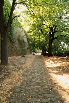 Cobble stone path leading up to the Upper Petrovaradin Fortress along one of its outer walls, Novi Sad, Serbia 2022