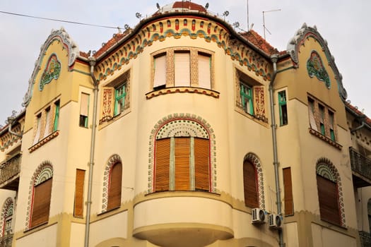 The facade and bay window of the Savings Bank Palace building, an example of Art Nouveau architecture in the city center of Subotica, Serbia 2022