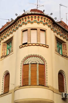 The facade, bay window of the Savings Bank Palace building, an example of Art Nouveau architecture in the city center of Subotica, Serbia 2022
