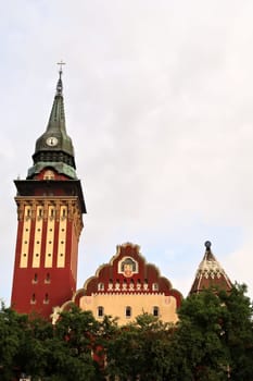 The upper facade and clock tower of the city hall, town hall of Subotica, an example of Art Nouveau architecture in the city center, Subotica, Serbia 2022