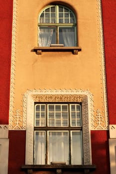 Two windows on the facade of the city hall, town hall of Subotica, an example of Art Nouveau architecture in the city center, Subotica, Serbia 2022