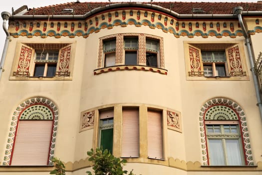 The facade of the Savings Bank Palace building, an example of Art Nouveau architecture in the city center of Subotica, Serbia 2022