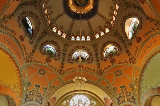 The ceiling, vault, dome inside the Synagogue of Subotica, completely covered in colorful patterns, details, paintings, Subotica, Serbia 2022