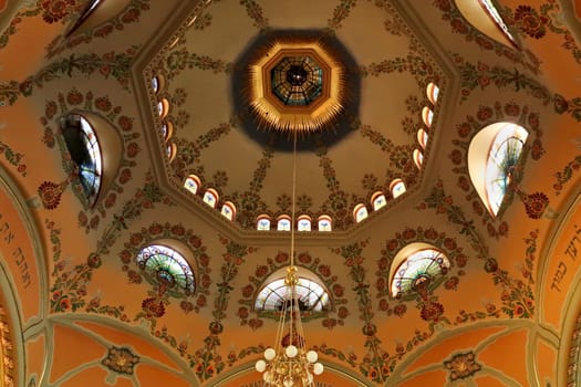 The colorful ceiling, vault, dome inside the Synagogue of Subotica, completely covered in floral patterns, details, paintings, Subotica, Serbia 2022