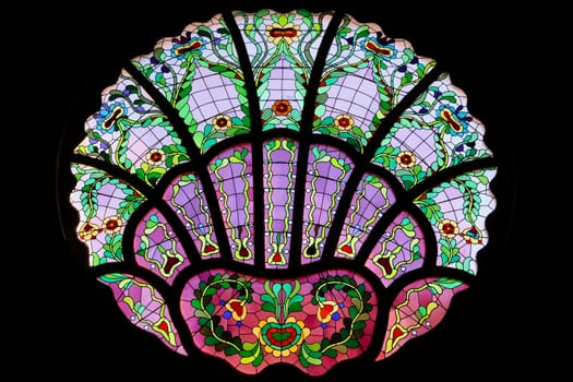 Stained glass window in different shades of purple inside the Synagogue of Subotica, second floor, Subotica, Serbia 2022