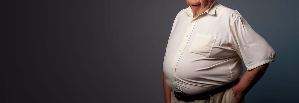 Senior elderly man with big belly. Obese man waist body fat. Obesity and weight loss. Older man on dark background copy space