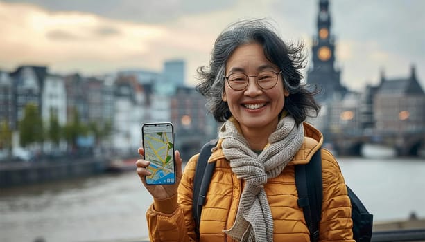 Asian tourist woman holding cell phone standing in city using smartphone fast connection, checking apps for travel navigation maps guide.