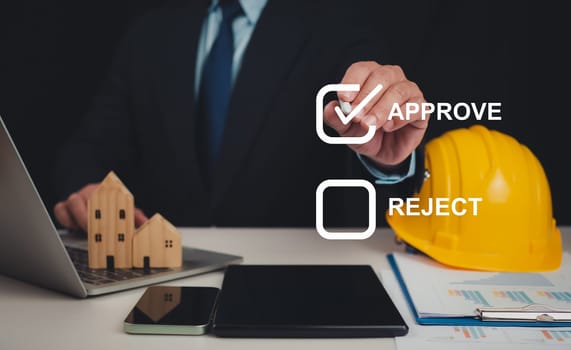 Approved Buildings Permit concept with approved residential building project, Architect or engineer Checking the list of documents and approving the project, Construction project inspection.