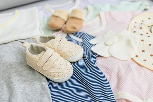 Baby clothes with baby shoes