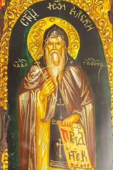 Detail of an icon with the image of an Eastern Orthodox saint.Selective focus with shallow depth of field.